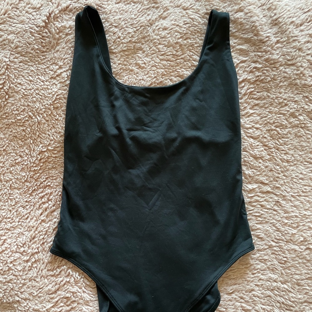 black, low-cut bodysuit